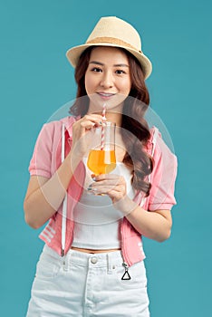 Pretty young woman with juicy watermelon on color background