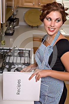 Pretty young woman in kitchen