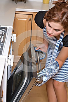 Pretty young woman in kitchen