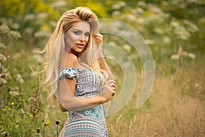 Pretty young woman in nature