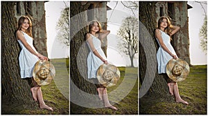 Pretty young woman posing in front of the farm. Very attractive blonde girl with white short dress holding a hat. Romantic girl