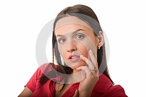 Pretty young woman in red or pink shirt isolated on white background