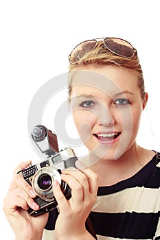 Pretty young woman with vintage camera kit