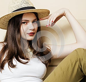Pretty young woman wearing sunglasses and summer hat, fashion people concept hipster