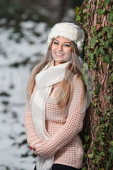 Pretty young woman in a winter fashion shot