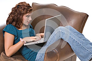 Pretty young woman working on computer