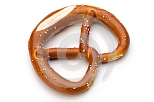 Pretzel isolated on white. Fresh fragrant brezel top view.