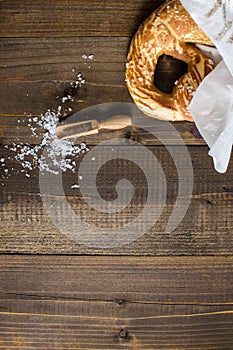 Pretzel with Sea Salt on Rustic Wooden Background