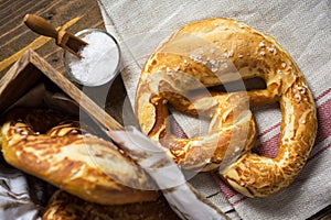 Pretzel with Sea Salt on Rustic Wooden Background