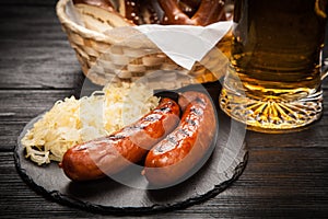 Pretzels, bratwurst and sauerkraut photo