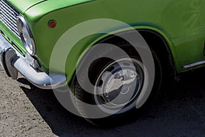 Prev Soviet green car with chrome caps
