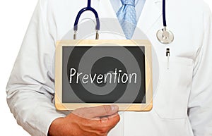 Prevention - Doctor with chalkboard photo