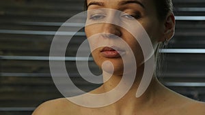 Prevention of skin aging, woman performs exercises for a face building. strengthening the muscles around the lips. slow