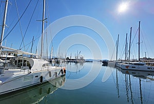 Preveza city new port yatches boats ships in lbue sea and sunny winter day in greece