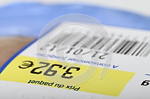 Price, bar code and expiration date on food product