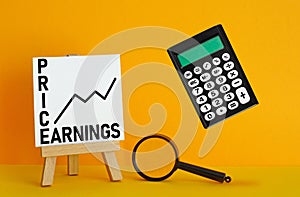 Price Earnings Ratio PER is shown using the text