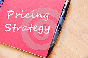 Pricing strategy write on notebook