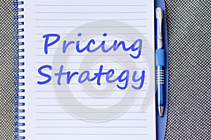 Pricing strategy write on notebook