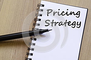 Pricing strategy write on notebook