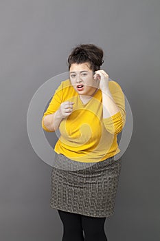 Pride and arrogance for overweight young woman photo