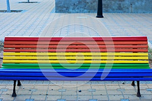 Pride flag painted in a public bench