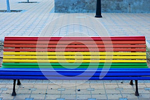 Pride flag painted in a public bench photo