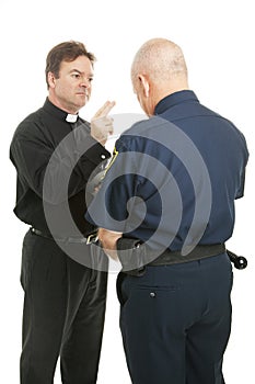 Priest Blesses Policeman photo