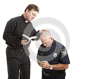 Priest Blesses Policeman