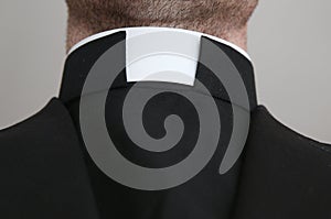 Priest with collar around the neck