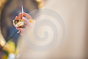 Priest` hands during a wedding ceremony