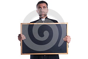Priest holding empty blackboard copy space