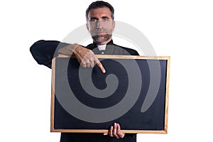 Priest holding empty blackboard copy space
