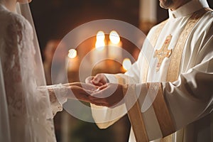 A priest officiating a wedding ceremony, joining the hands offering a blessing, symbolizing the sacred union of marriage.