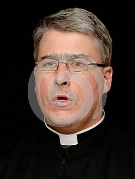 Priest speaking