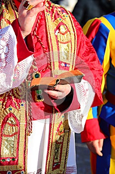 Priest in Vestments Blessing with Swiss Guard at Side