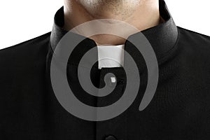 Priest wearing cassock with clerical collar on white background, closeup photo