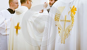 Priest ` hands during a wedding ceremony/nuptial mass photo