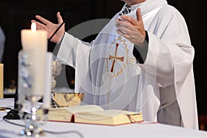 Priest and worship at the altar