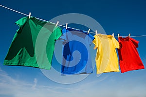 Primary Colored T-Shirts on a clothesline