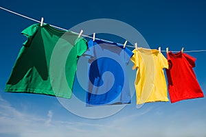 Primary Colored T-Shirts on a clothesline photo