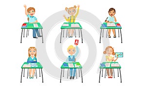 Primary Schools Pupils Sitting at Desks at Classroom, Kids on School Lesson, School Children Studying at School Vector
