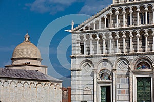 Primatial Metropolitan Cathedral of the Assumption of Mary and the dome of the Monumental Cemetery in Pisa photo