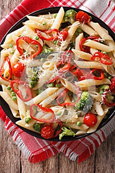 Primavera Italian pasta with vegetables closeup. vertical top vi