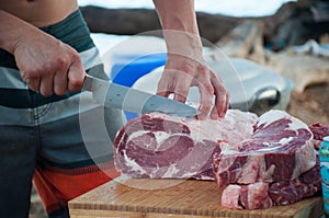 Prime rib steaks at a beach bbq