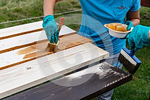 Priming boards for painting with a brush outdoors
