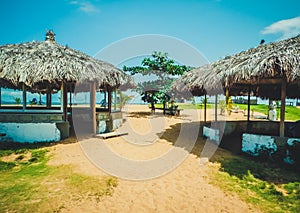 Primitive covered with reeds beach cabanas. Monrovia the capital of Liberia, Africa