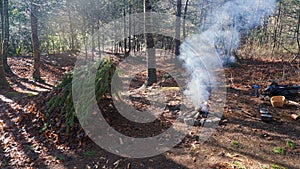 Primitive Spring A frame Survival Shelter in the Blue Ridge Mountains near Asheville, North Carolina. Bushcraft camp setup in the