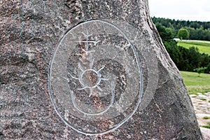 Primitive stone inscription of Sun, Moon and Venus