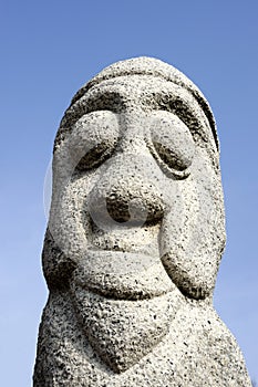 Primitive stone statue