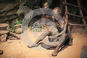 Primitive woman working